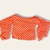 Blusa naranja con estampado de lunares